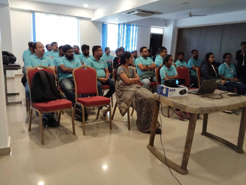 Employees participating in workplace harassment prevention training in Bengaluru.